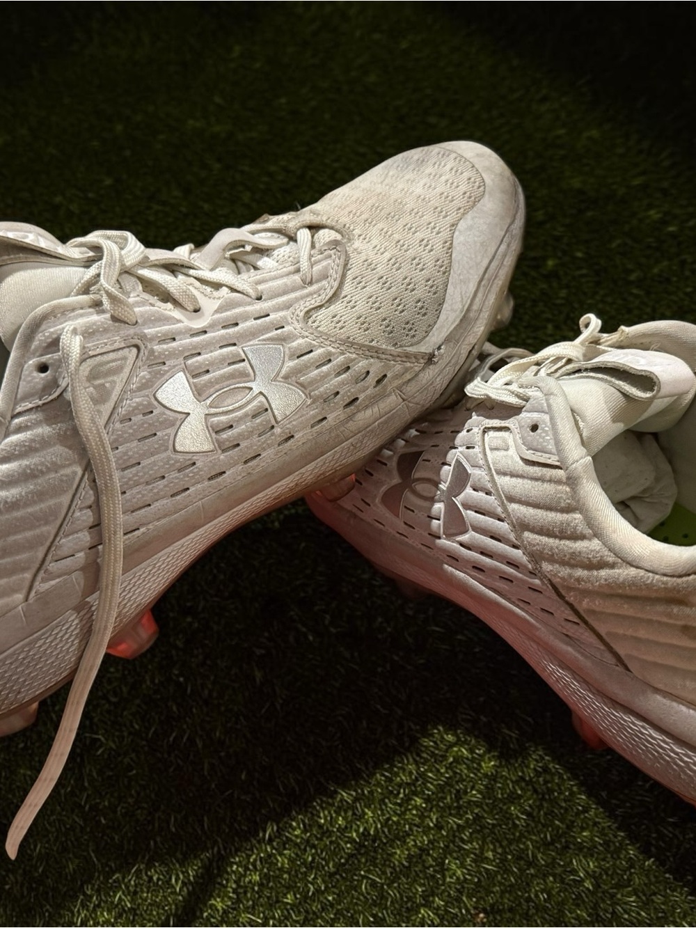Under Armour White Men’s Athletic Cleats with Subtle Pink Studs